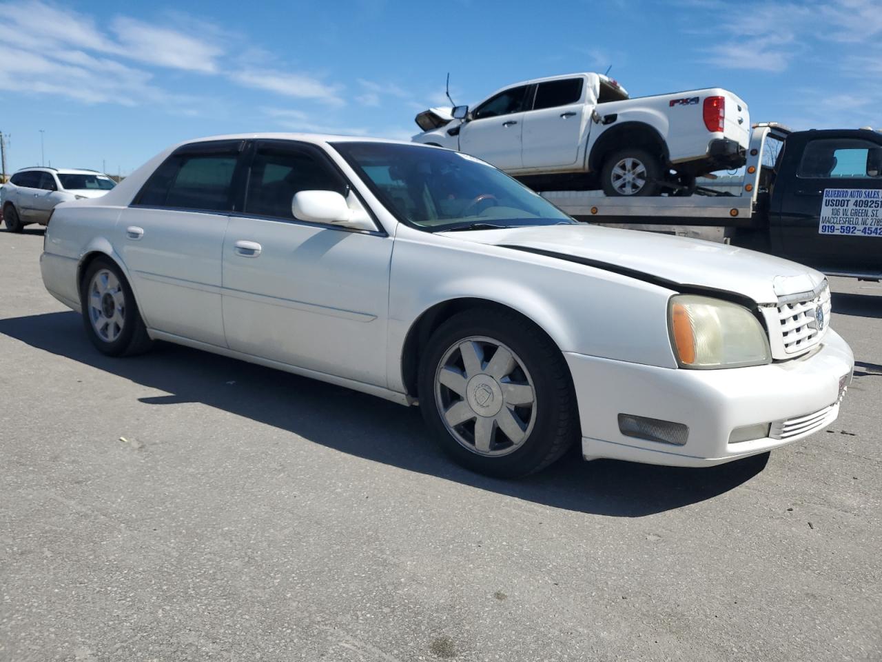2005 Cadillac De Ville VIN 1G6KF57915U233705 Copart auction photo, front end damage thumbnail 4