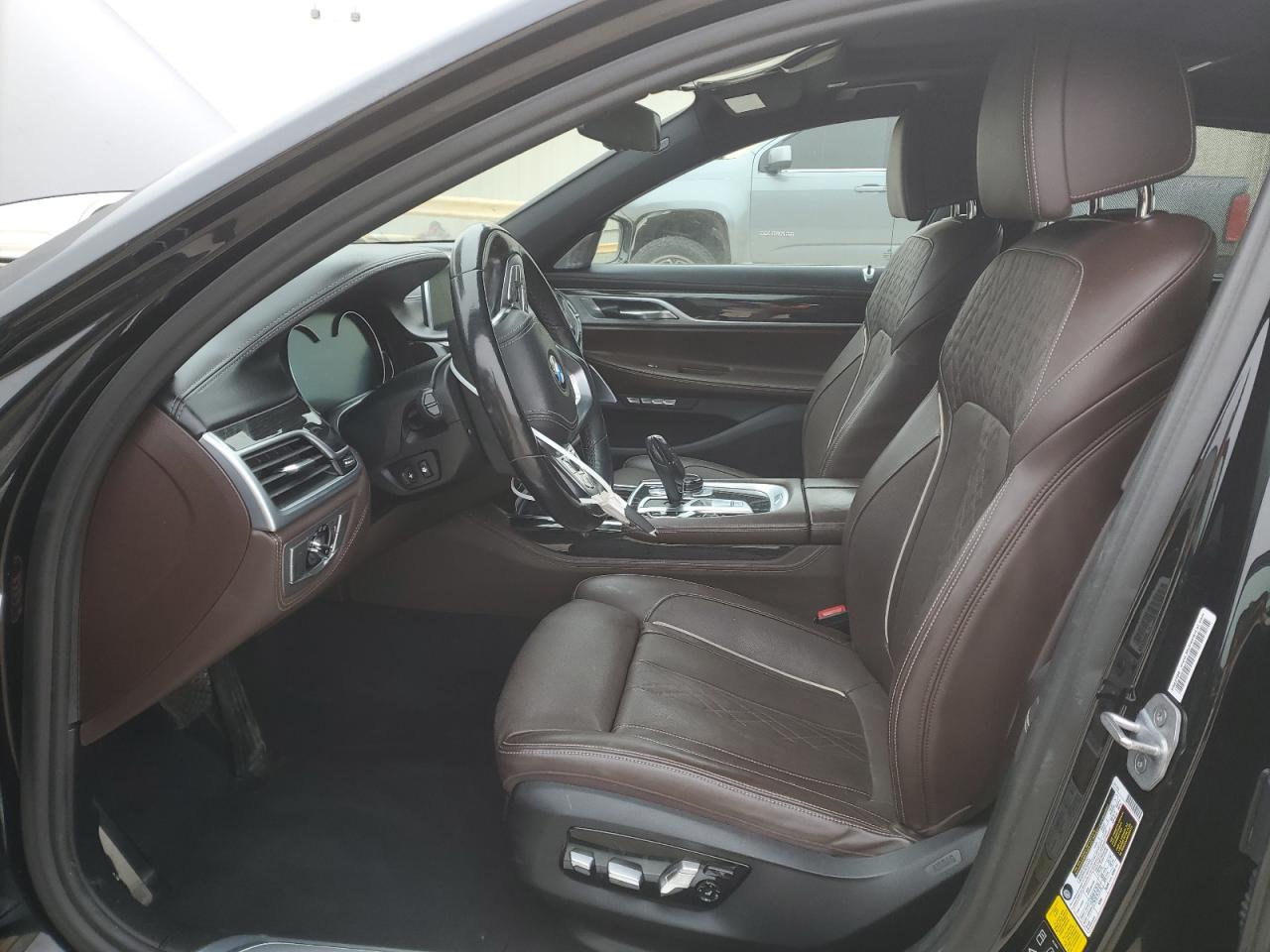2018 BMW 7er VIN WBA7F2C5XJG423853 Copart auction photo, undercarriage / minor dent/scratches damage thumbnail 7