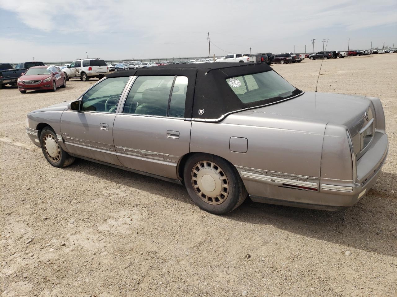 1998 Cadillac De Ville VIN 1G6KD54Y2WU797558 Copart auction photo, side / front end damage thumbnail 2
