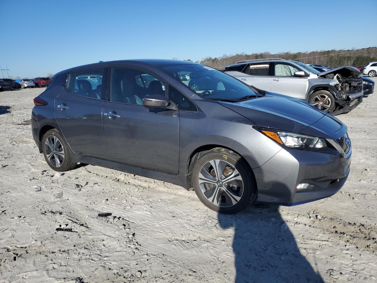 2020 Nissan Leaf VIN 1N4BZ1DP7LC309890 Copart auction photo, front end / side damage thumbnail 4