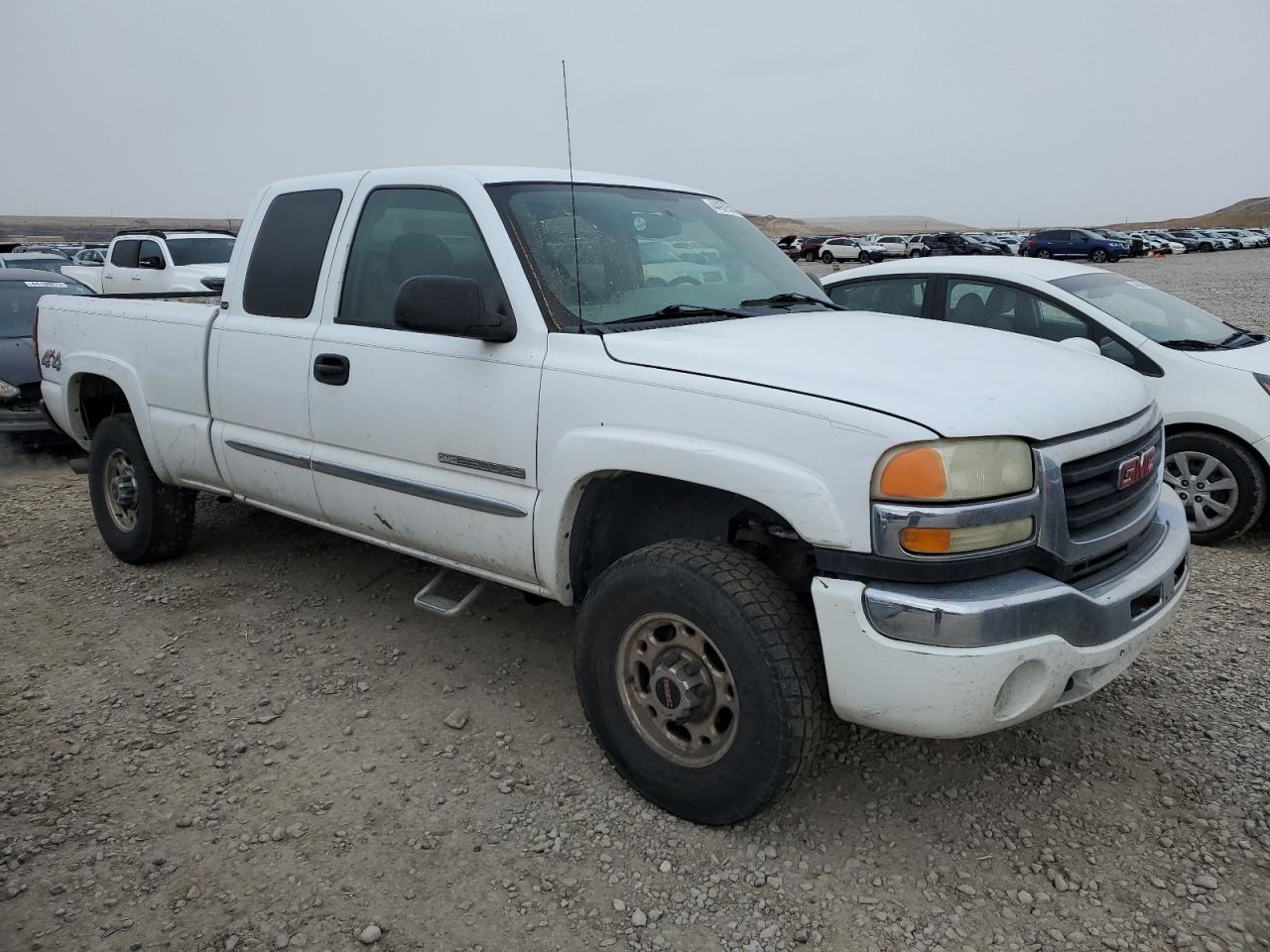 2004 GMC Sierra VIN 1GTHK29U64E336548 Copart auction photo, side damage thumbnail 4