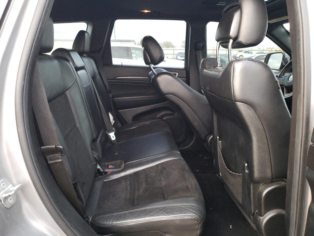 2014 Jeep Grand Cherokee VIN 1C4RJFAG0EC486754 Copart auction photo, side / rear end damage thumbnail 11