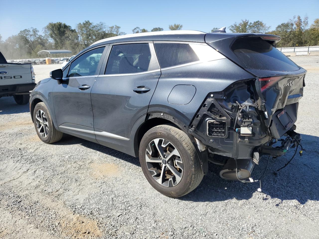2023 KIA Sportage VIN 5XYK3CAF4PG110655 Copart auction photo, rear end / minor dent/scratches damage thumbnail 2