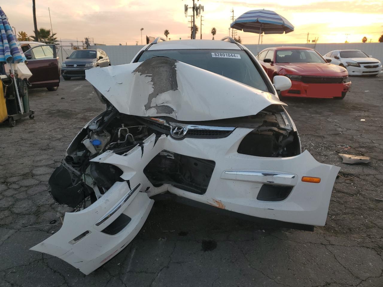 2012 Hyundai Elantra VIN KMHDC8AE3CU151098 Copart auction photo, front end damage thumbnail 5