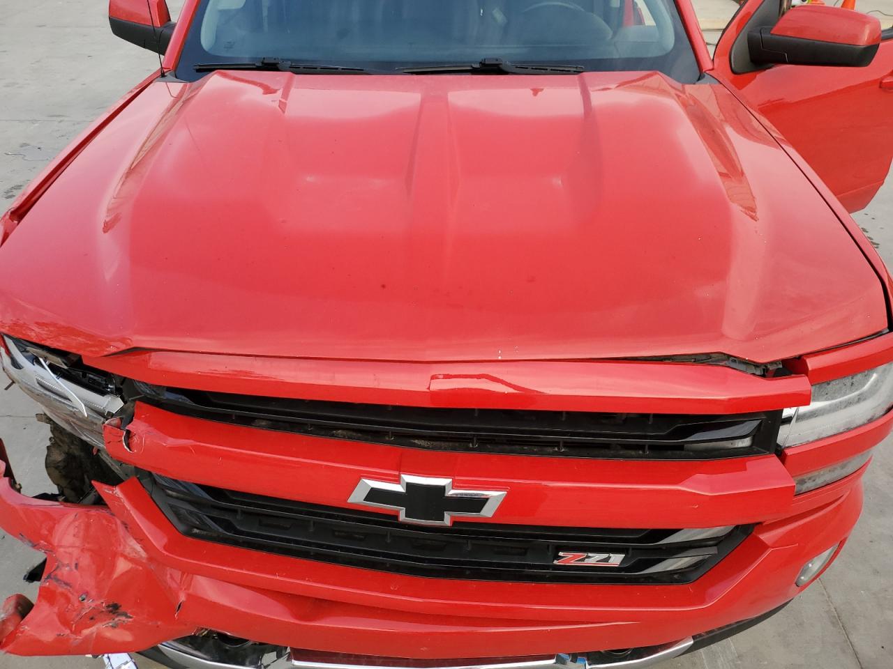 2016 Chevrolet Silverado VIN 3GCUKREC7GG150051 Copart auction photo, front end / minor dent/scratches damage thumbnail 13