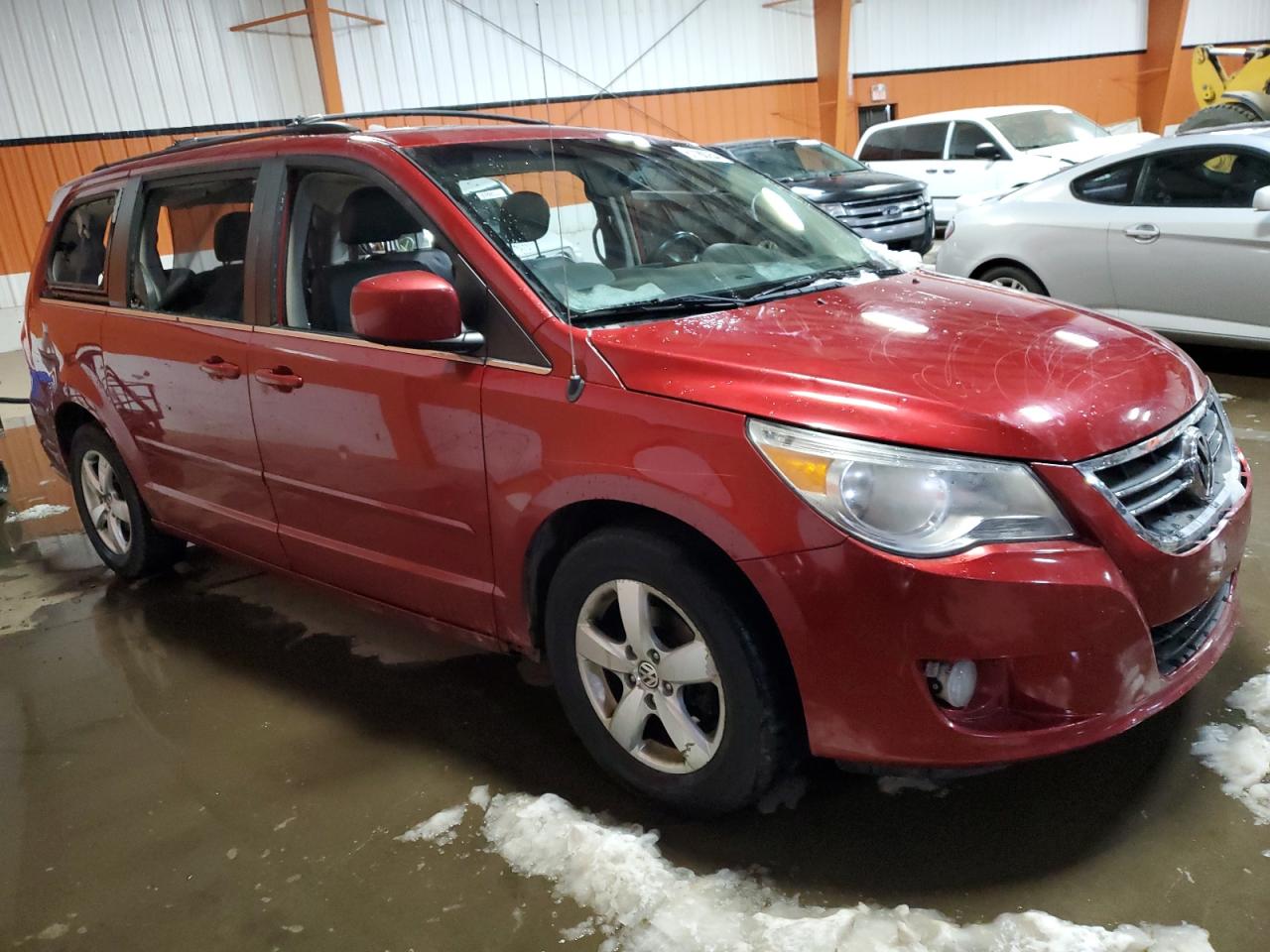 2009 Volkswagen Routan VIN 2V8HW54X59R609159 Copart auction photo, vandalism / minor dent/scratches damage thumbnail 4
