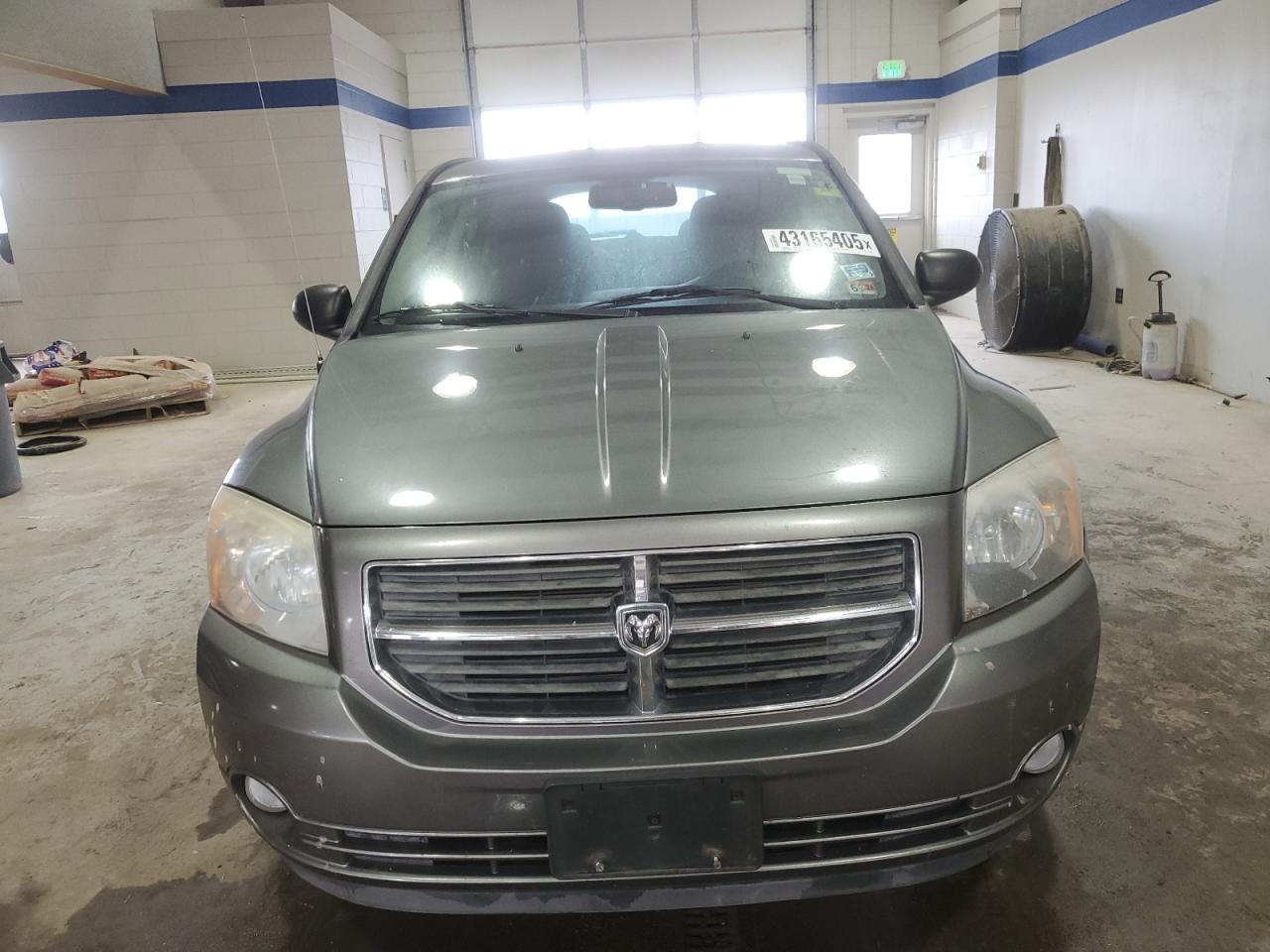 2011 Dodge Caliber VIN 1B3CB3HA0BD295586 Copart auction photo, rear end damage thumbnail 5
