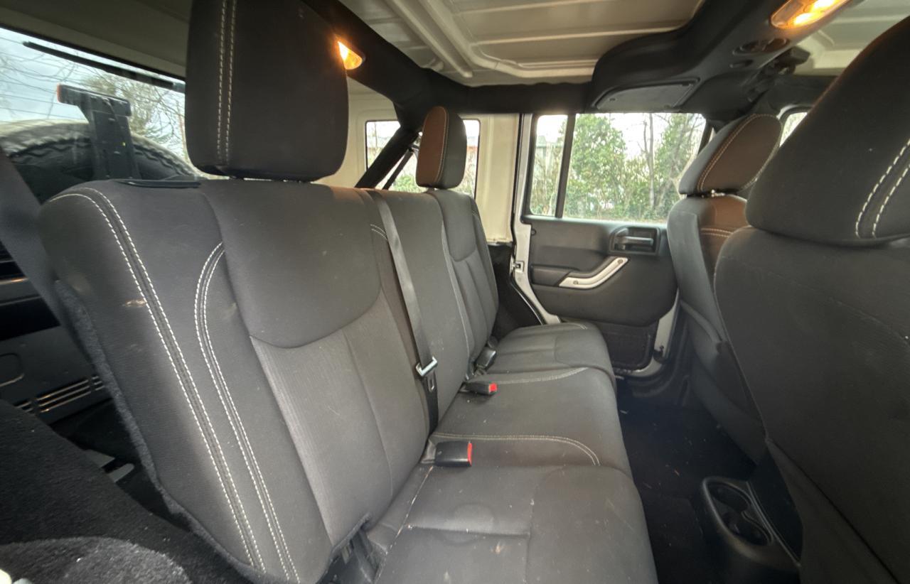2015 Jeep Wrangler VIN 1C4HJWEG7FL776867 Copart auction photo, normal wear / minor dent/scratches damage thumbnail 6