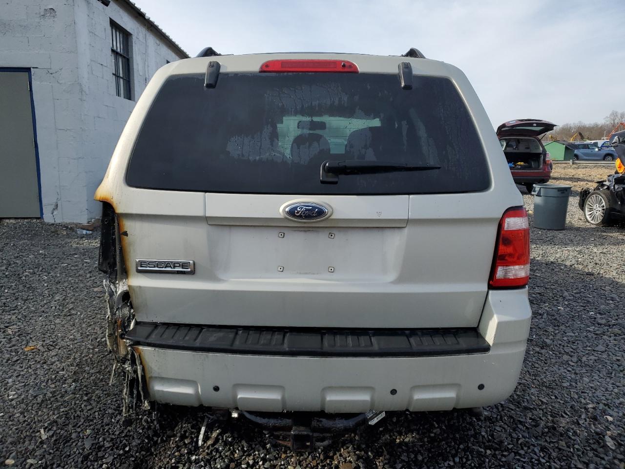 2009 Ford Escape VIN 1FMCU03769KB21266 Copart auction photo, burn damage thumbnail 6