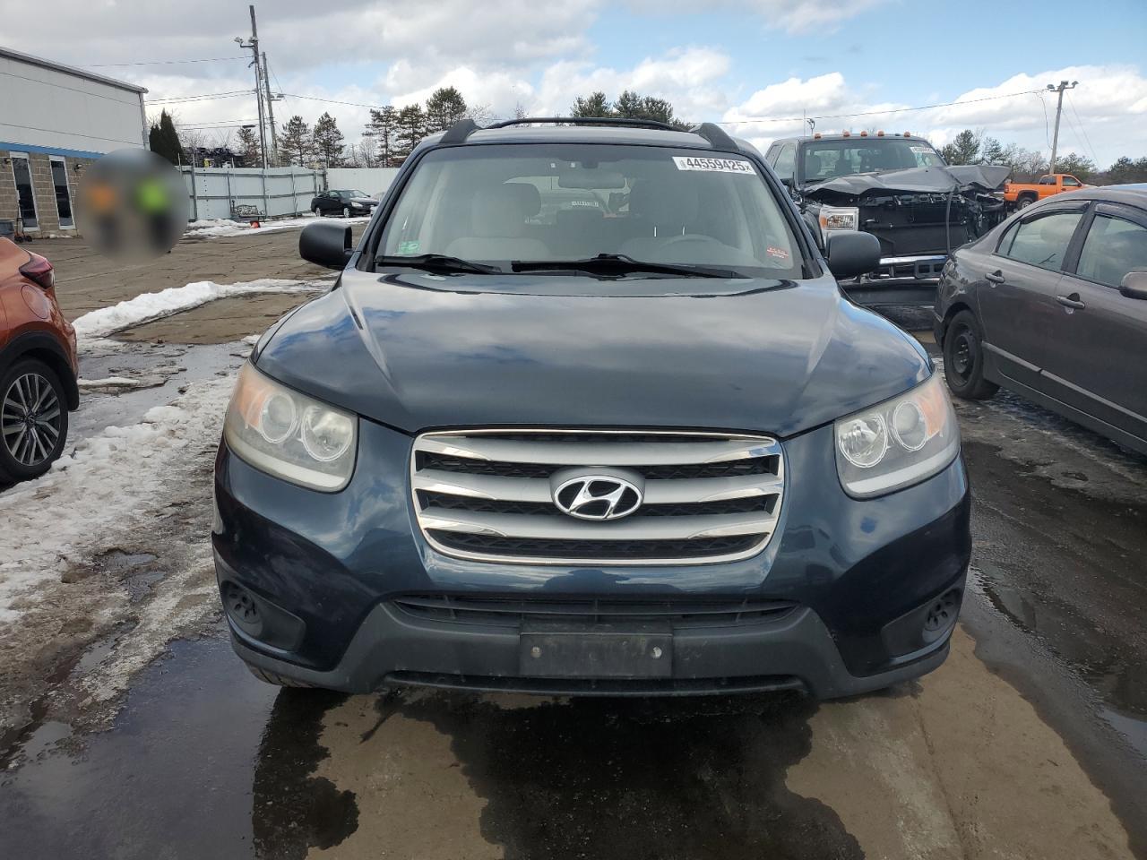 2012 Hyundai Santa Fe VIN 5XYZGDAB6CG141163 Copart auction photo, undercarriage damage thumbnail 5