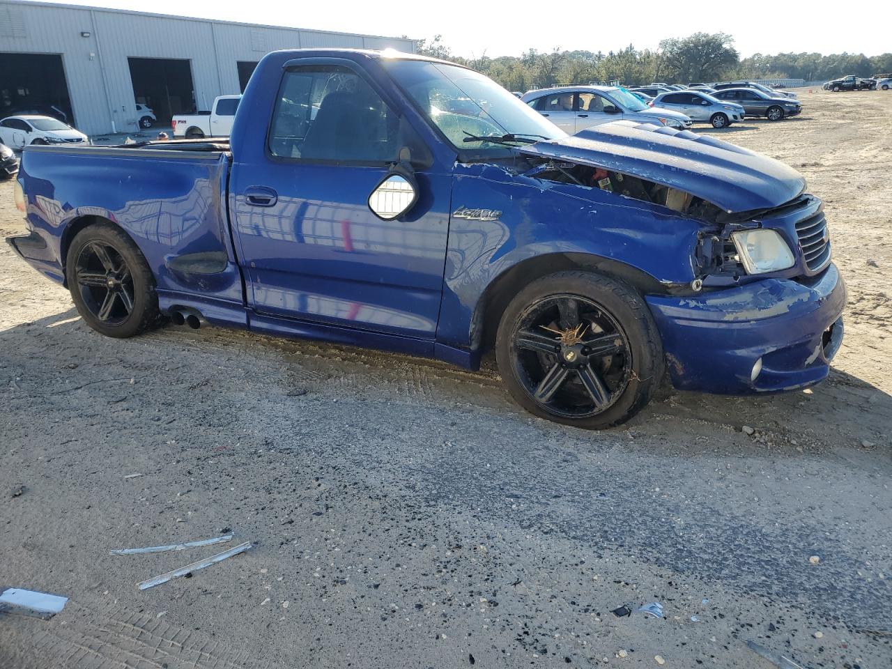 2004 Ford F-150 VIN 2FTRF07394CA62825 Copart auction photo, all over damage thumbnail 4