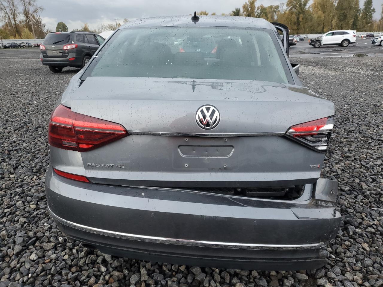 2017 Volkswagen Passat VIN 1VWGT7A30HC003883 Copart auction photo, rear end / undercarriage damage thumbnail 6