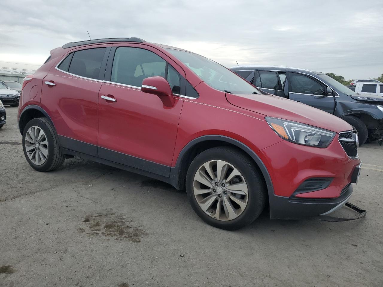 2019 Buick Encore VIN KL4CJASB6KB879777 Copart auction photo, side / front end damage thumbnail 4
