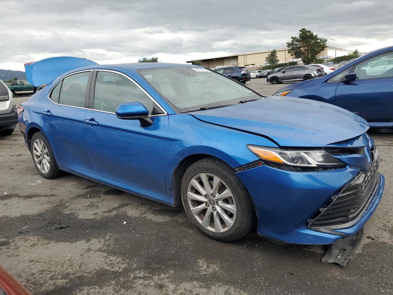 2019 Toyota Camry VIN 4T1B11HK7KU254765 Copart auction photo, rear end / front end damage thumbnail 4