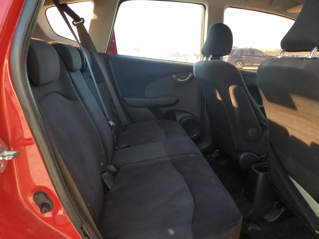 2009 Honda Fit VIN JHMGE88459S036434 Copart auction photo, side / minor dent/scratches damage thumbnail 11
