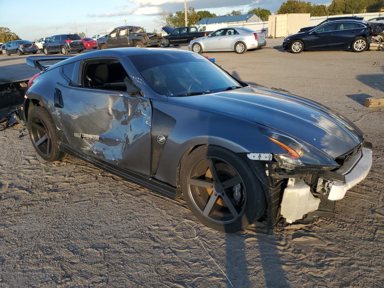2009 Nissan 370Z VIN JN1AZ44E69M403965 Copart auction photo, all over damage thumbnail 4