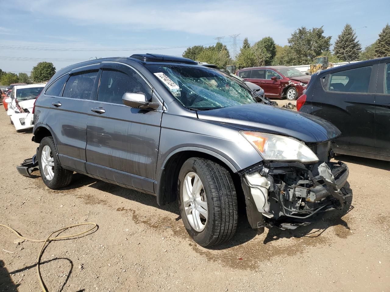 2010 Honda CR-V VIN JHLRE4H74AC014598 Copart auction photo, all over damage thumbnail 4