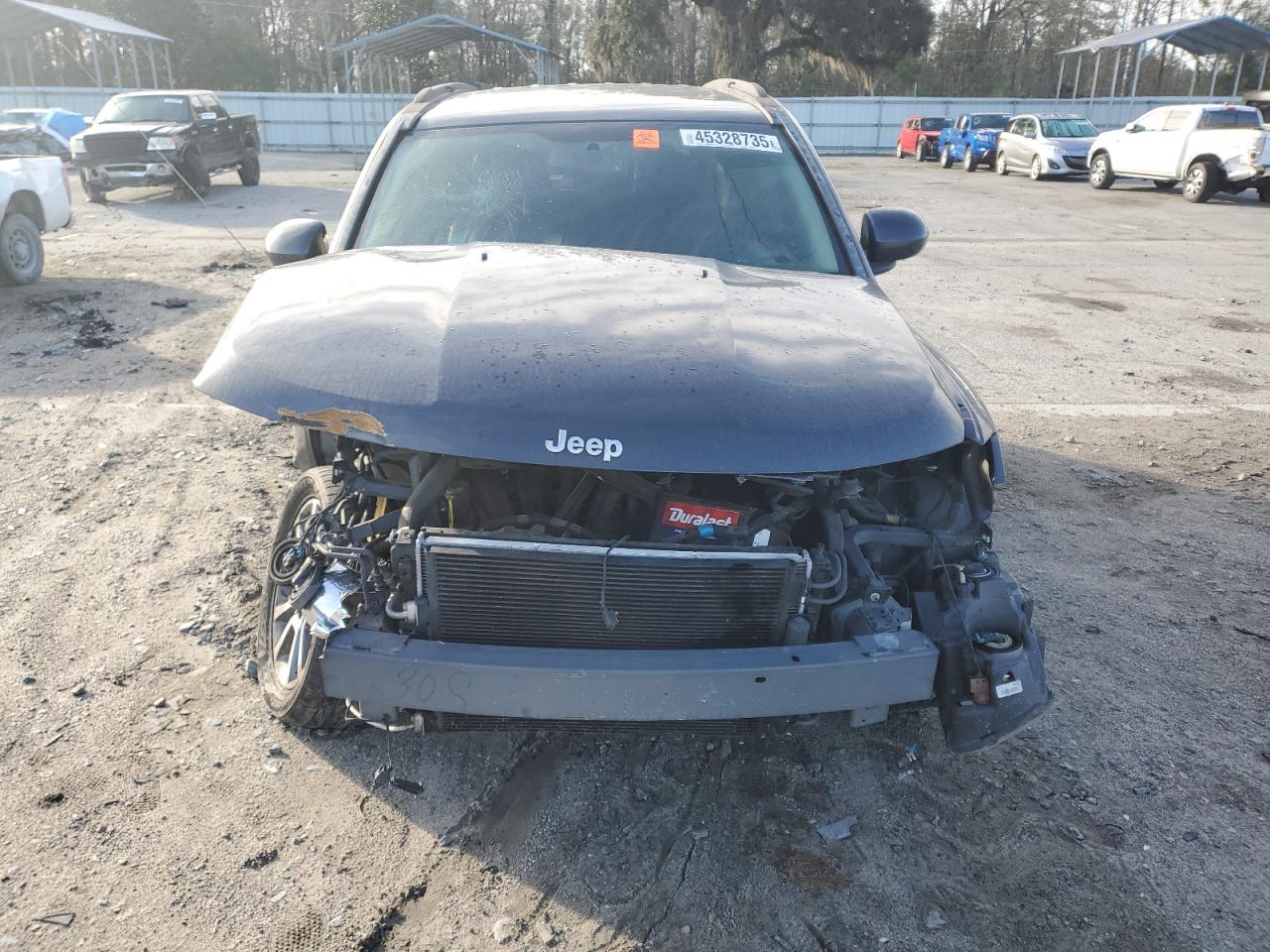 2016 Jeep Compass VIN 1C4NJCEA4GD563061 Copart auction photo, front end damage thumbnail 5