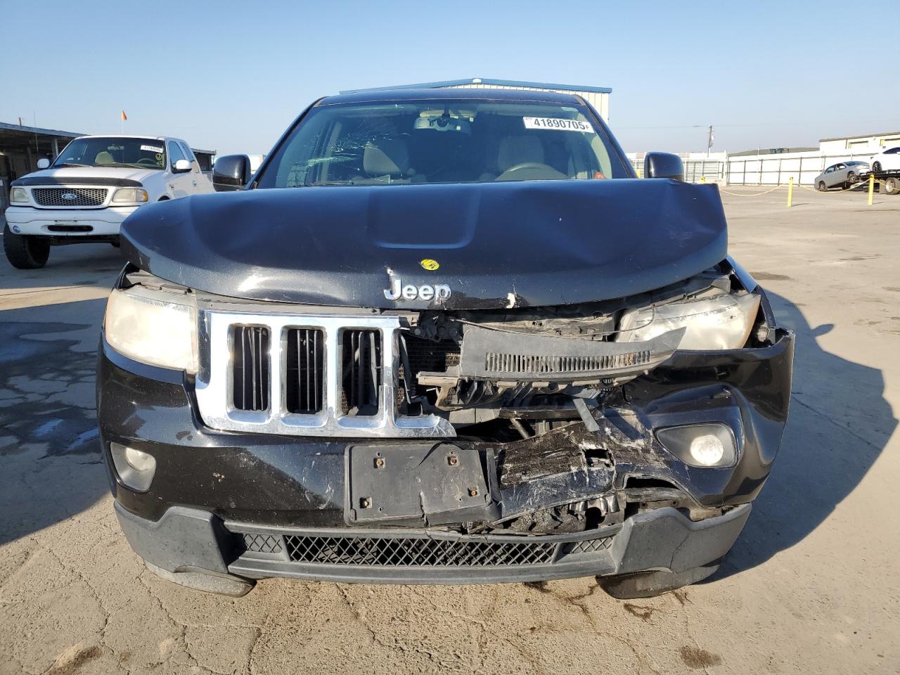 2012 Jeep Grand Cherokee VIN 1C4RJFAG1CC256444 Copart auction photo, front end / side damage thumbnail 5