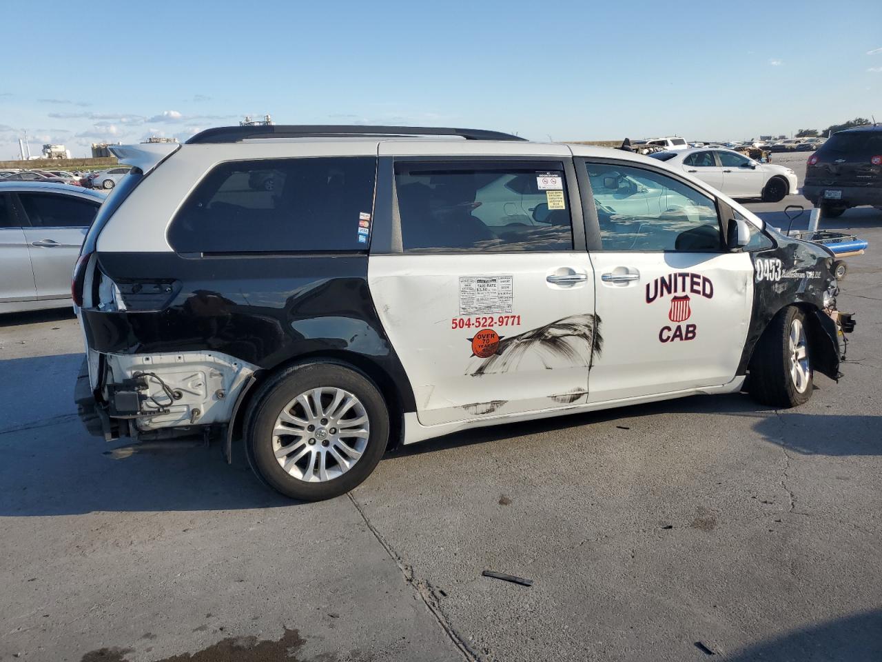 2015 Toyota Sienna VIN 5TDYK3DCXFS677243 Copart auction photo, front end / rear end damage thumbnail 3