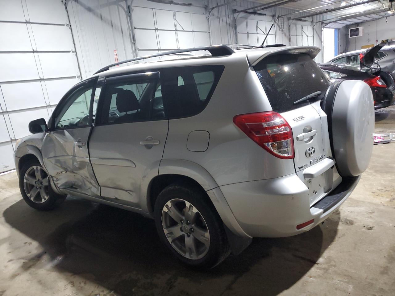 2009 Toyota RAV 4 VIN JTMBF32V595007799 Copart auction photo, front end / side damage thumbnail 2