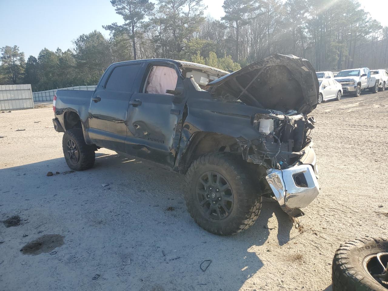 2021 Toyota Tundra VIN 5TFDY5F16MX002985 Copart auction photo, front end / side damage thumbnail 4
