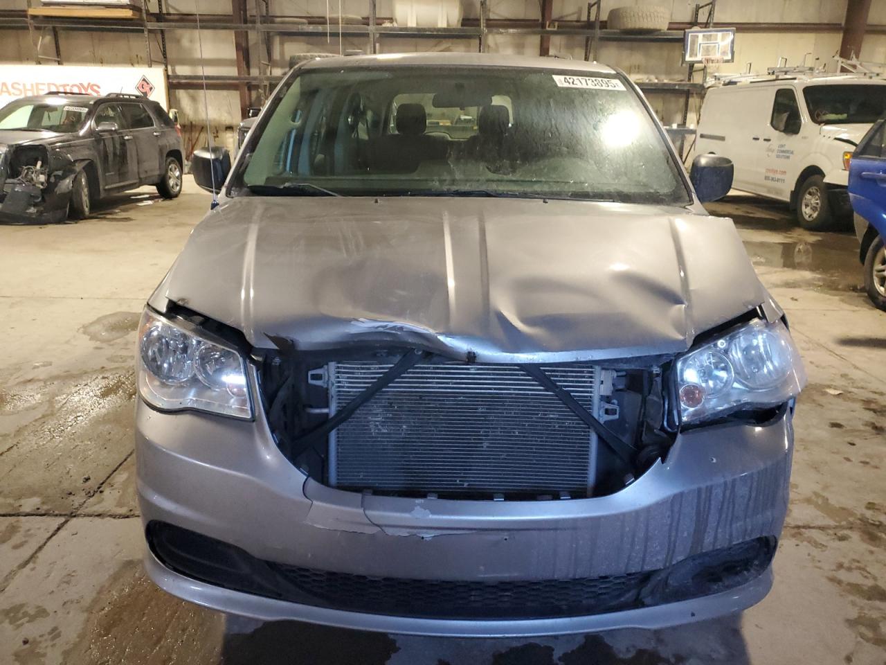2016 Dodge Caravan VIN 2C4RDGBG0GR160698 Copart auction photo, front end / minor dent/scratches damage thumbnail 5