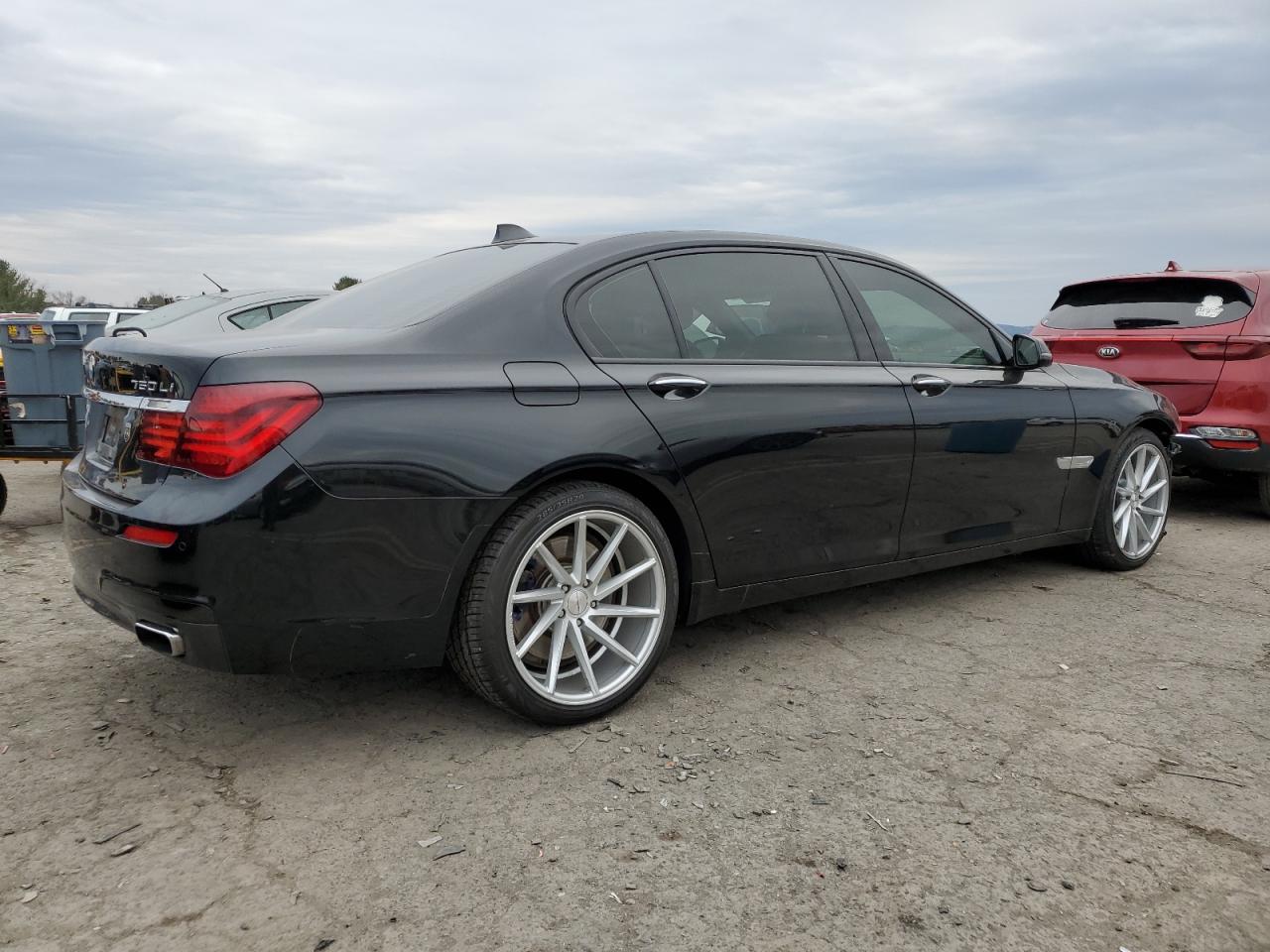 2015 BMW 7er VIN WBAYF8C54FD654795 Copart auction photo, front end / side damage thumbnail 3