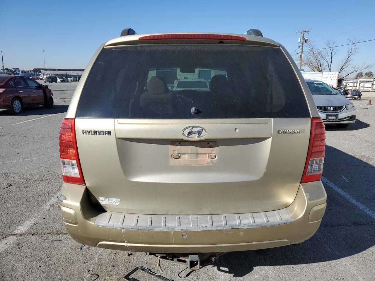 2008 Hyundai Entourage VIN KNDMC233086044132 Copart auction photo, front end / side damage thumbnail 6