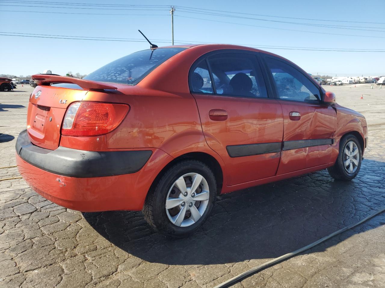 2008 KIA Rio VIN KNADE123886296889 Copart auction photo, side / front end damage thumbnail 3
