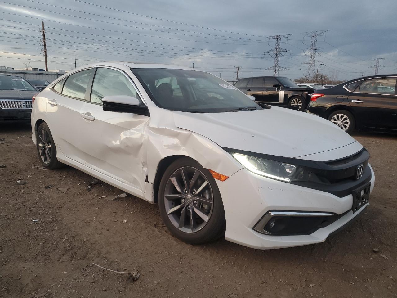 2021 Honda Civic VIN 19XFC1F34ME010892 Copart auction photo, front end / side damage thumbnail 4