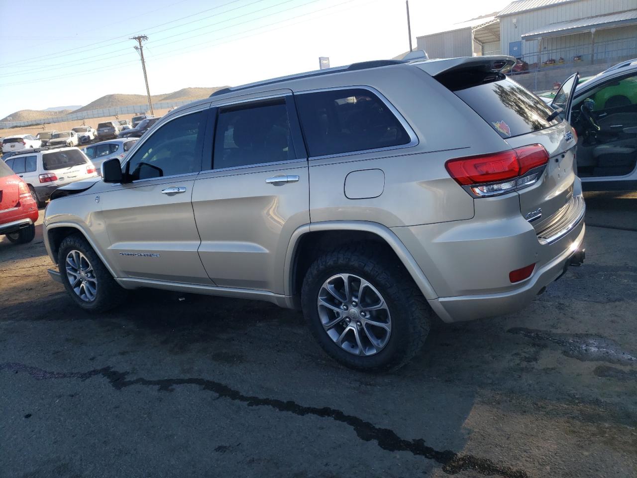 2014 Jeep Grand Cherokee VIN 1C4RJFCM2EC556953 Copart auction photo, front end damage thumbnail 2
