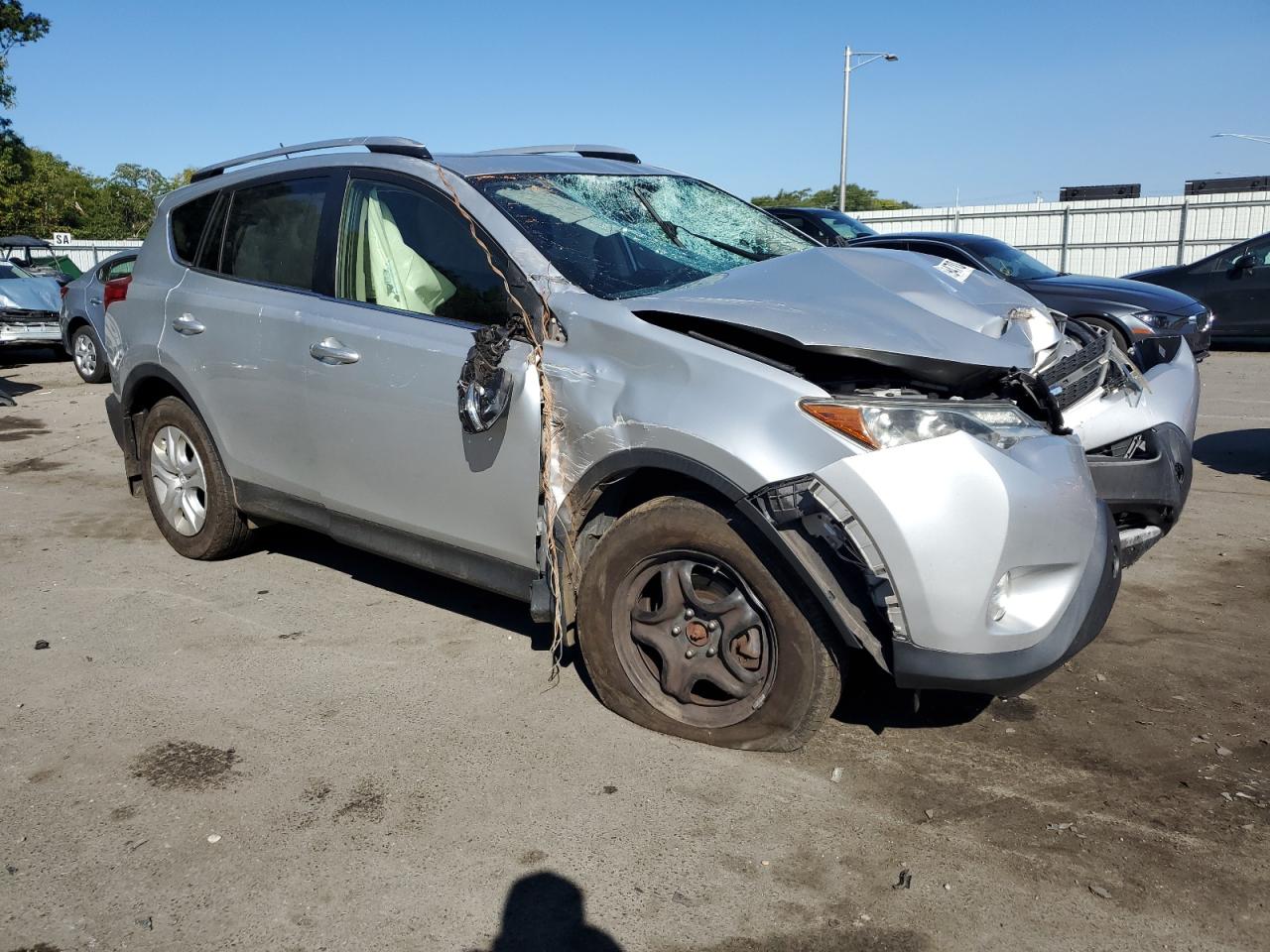 2015 Toyota RAV 4 VIN JTMRFREV7FJ026063 Copart auction photo, front end damage thumbnail 4