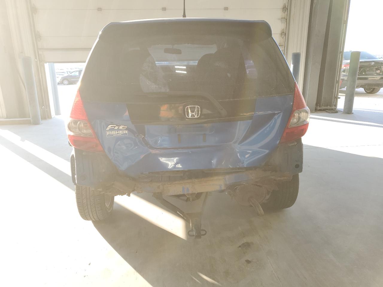 2007 Honda Fit VIN JHMGD38657S006189 Copart auction photo, rear end / front end damage thumbnail 6