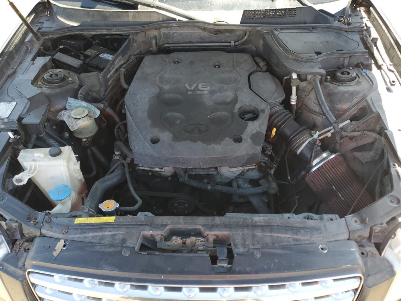 2004 Infiniti FX VIN JNRAS08U34X107451 Copart auction photo, side / minor dent/scratches damage thumbnail 13