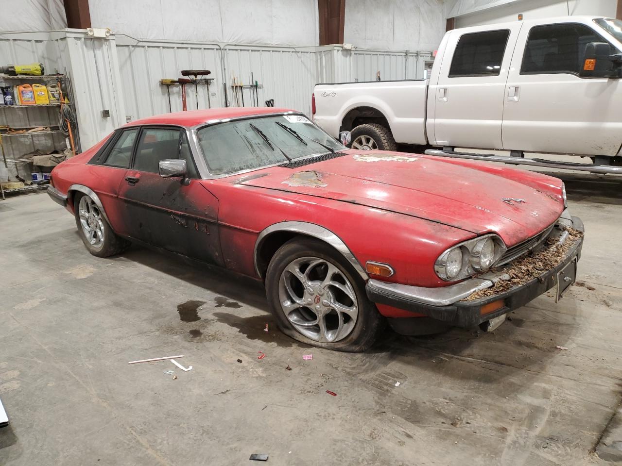 1985 Jaguar XJS VIN SAJNV5843FC122582 Copart auction photo, burn - engine / burn damage thumbnail 4