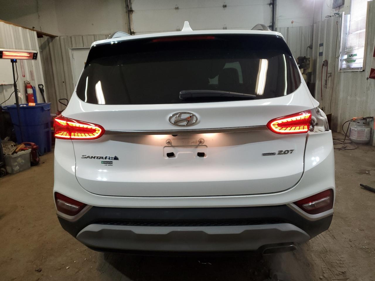 2019 Hyundai Santa Fe VIN 5NMS5CAA7KH018775 Copart auction photo, front end / side damage thumbnail 6