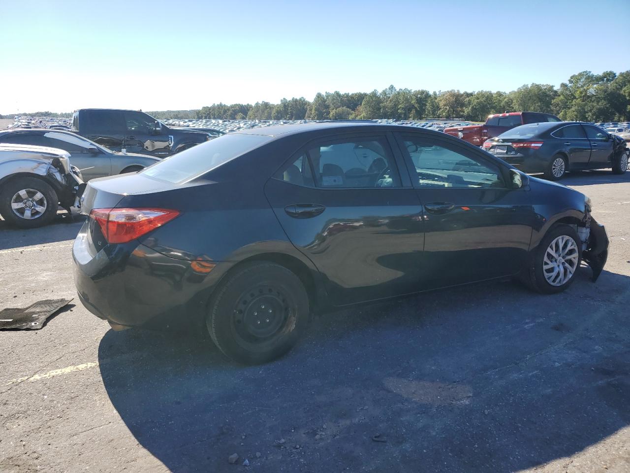 2017 Toyota Corolla VIN 5YFBURHE2HP674556 Copart auction photo, front end / side damage thumbnail 3