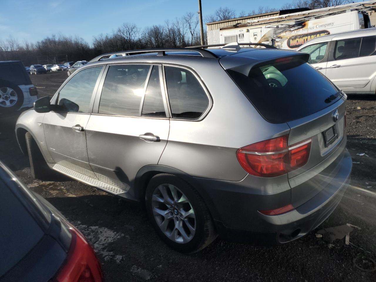 2012 BMW X5 VIN 5UXZV4C52CL748595 Copart auction photo, front end / undercarriage damage thumbnail 2