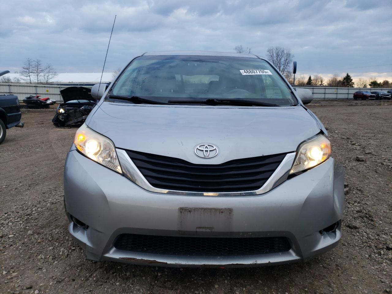 2012 Toyota Sienna VIN 5TDKK3DC9CS213796 Copart auction photo, front end / side damage thumbnail 5
