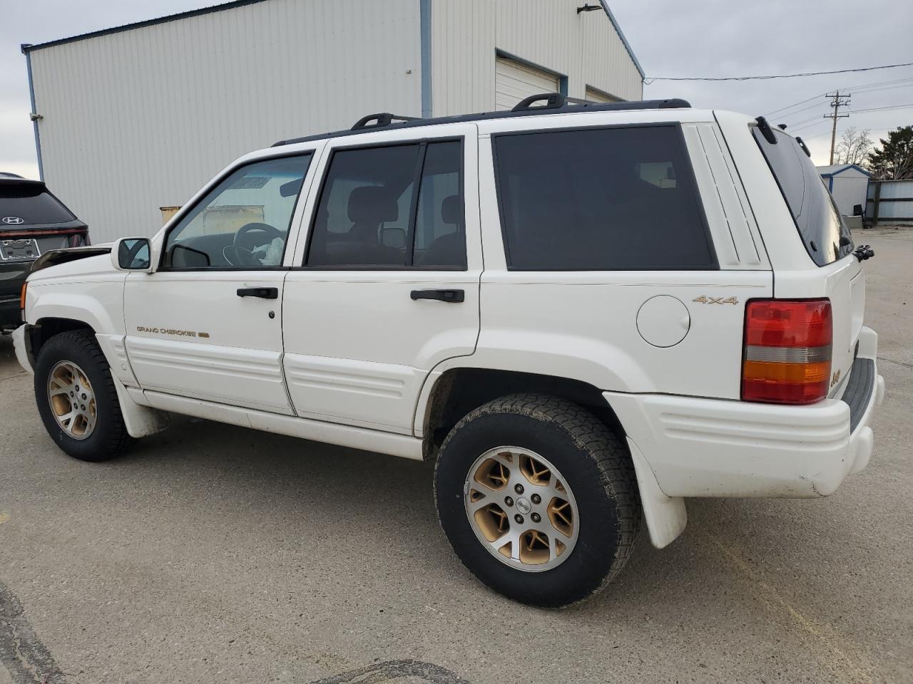 1998 Jeep Grand Cherokee VIN 1J4GZ78Y5WC259043 Copart auction photo, front end / frame damage damage thumbnail 2