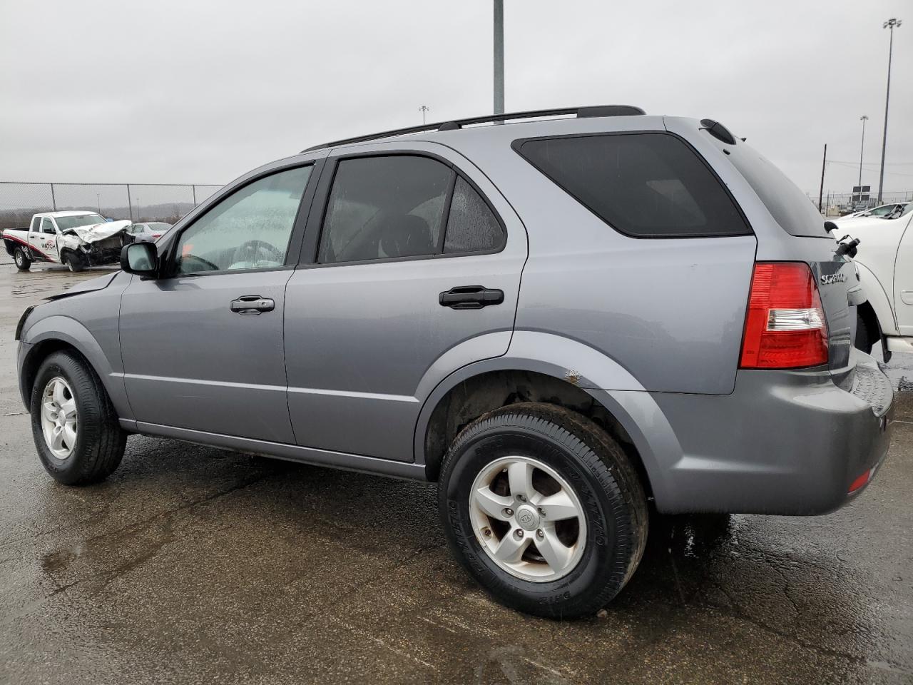 2009 KIA Sorento VIN KNDJC735695868614 Copart auction photo, all over / undercarriage damage thumbnail 2