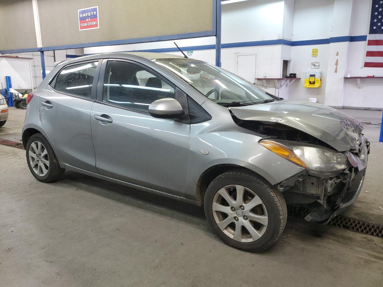 2012 Mazda 2 VIN JM1DE1LZ2C0146049 Copart auction photo, front end / side damage thumbnail 4