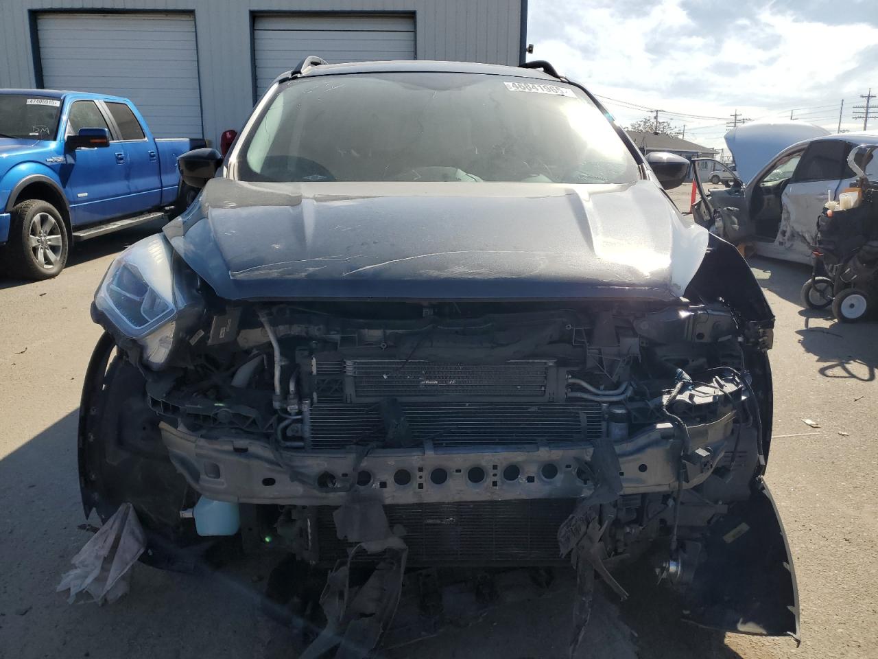 2018 Ford Escape VIN 1FMCU9HD7JUD59560 Copart auction photo, front end damage thumbnail 5