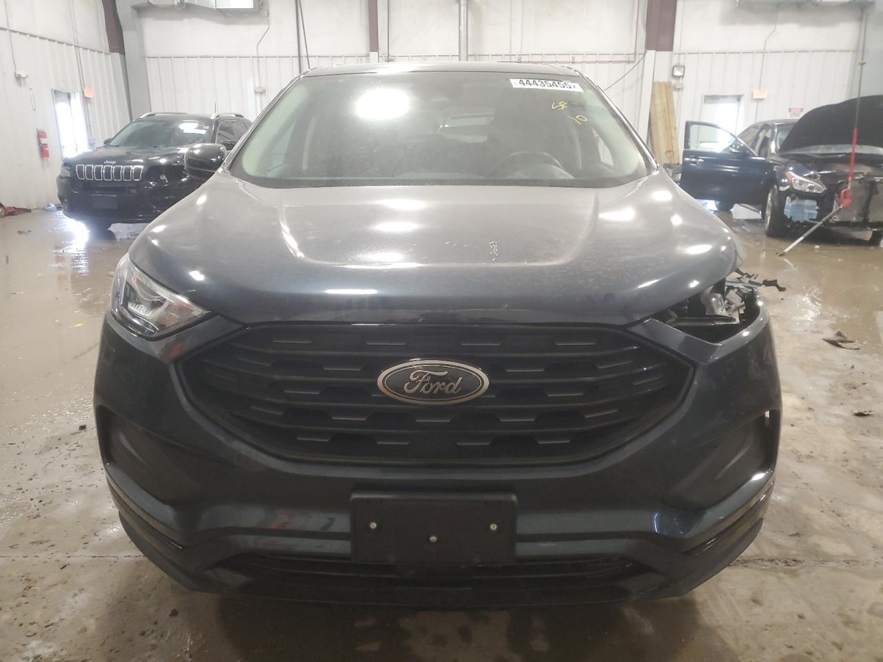 2023 Ford Edge VIN 2FMPK4G99PBA50422 Copart auction photo, front end / side damage thumbnail 5