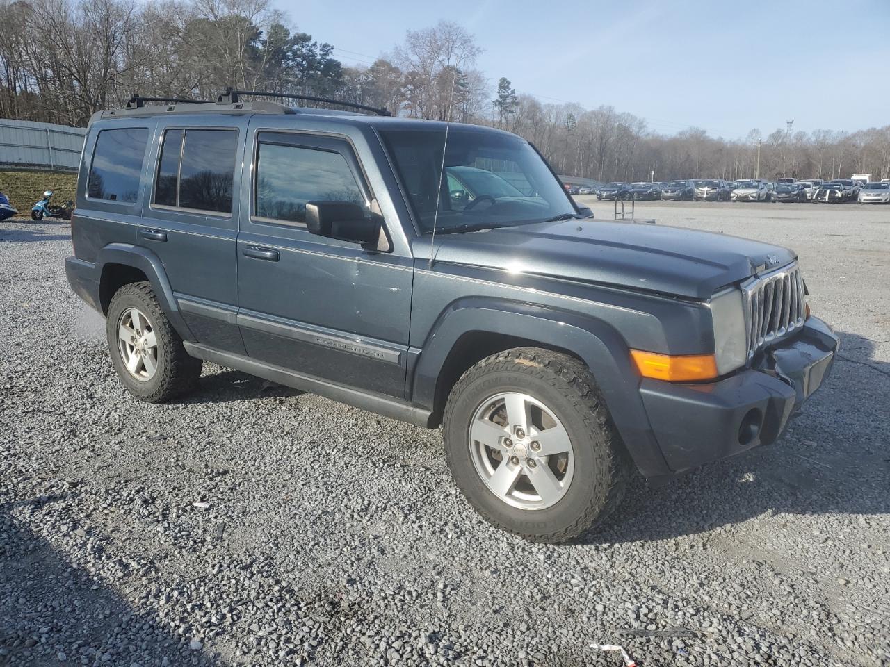 2007 Jeep Commander VIN 1J8HH48K07C587326 Copart auction photo, front end / side damage thumbnail 4