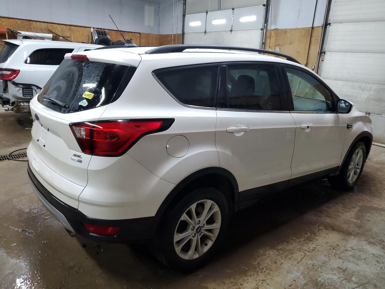 2019 Ford Escape VIN 1FMCU9HD2KUA16706 Copart auction photo, front end / minor dent/scratches damage thumbnail 3