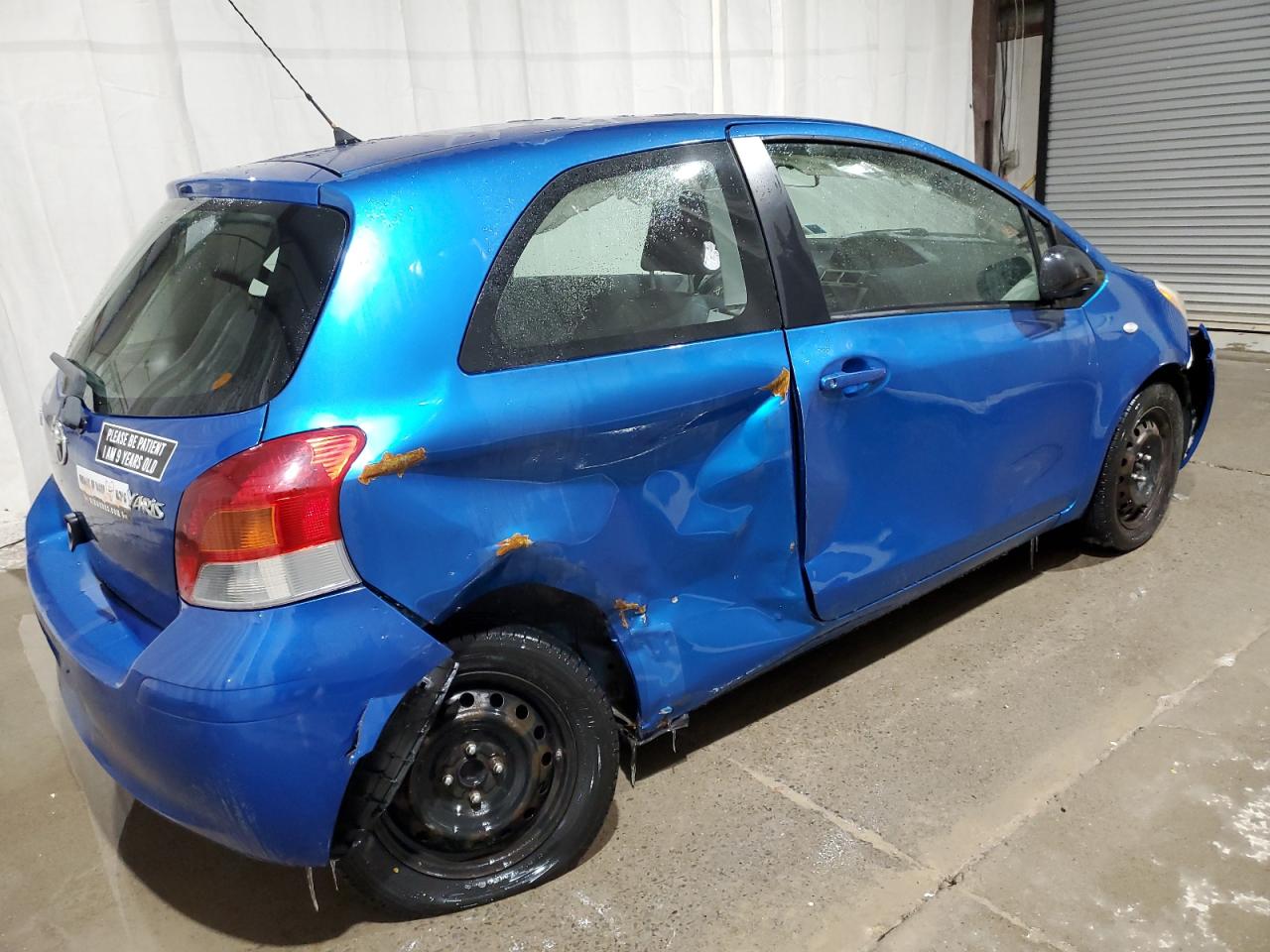 2010 Toyota Yaris VIN JTDJT4K33A5281662 Copart auction photo, side / front end damage thumbnail 3