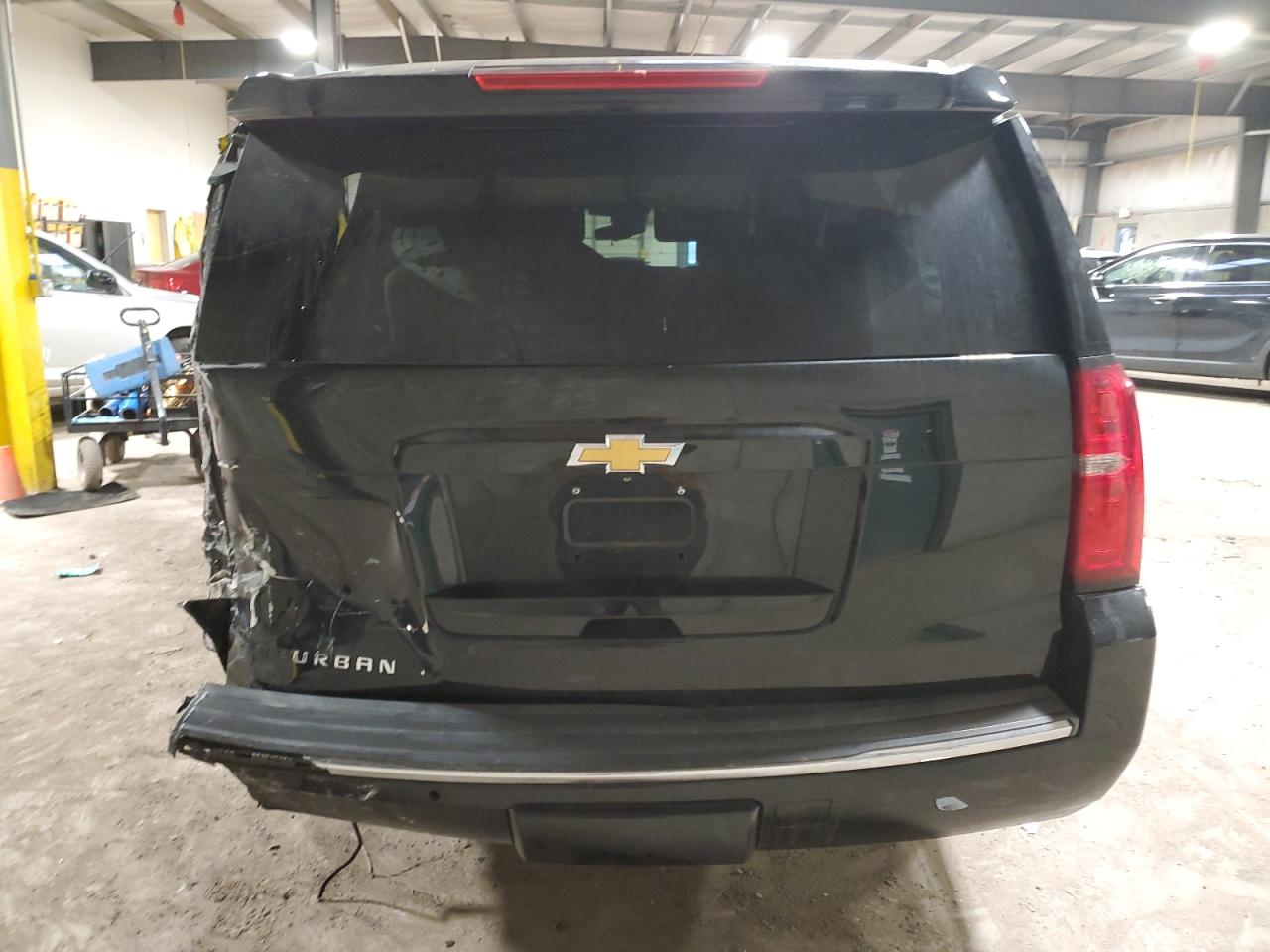 2015 Chevrolet Suburban VIN 1GNSKKKC1FR502713 Copart auction photo, rear end / side damage thumbnail 6