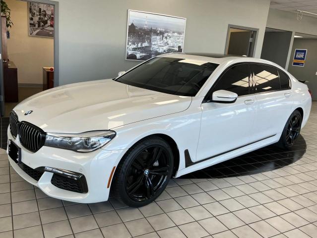 2018 BMW 7er VIN WBA7E2C50JG743251 Copart auction photo, minor dent/scratches / normal wear damage thumbnail 2